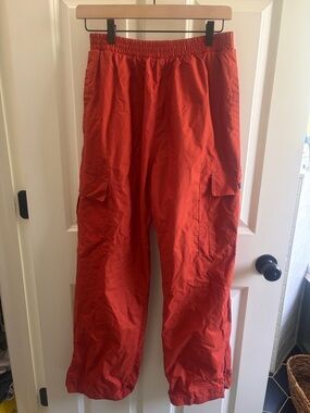 Old Navy orange Cargo Parachute Pants. Waist stretches to 28/29” Mesh lined